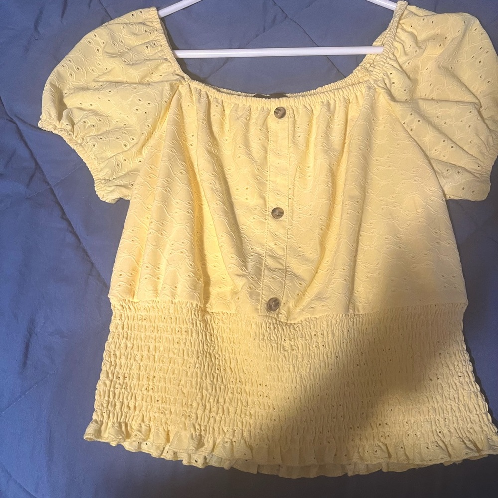 Yellow top. Puffy sleeves. Worn once